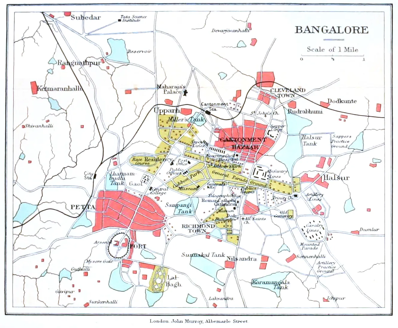 A traveller reading a map while planning a trip from Bangalore